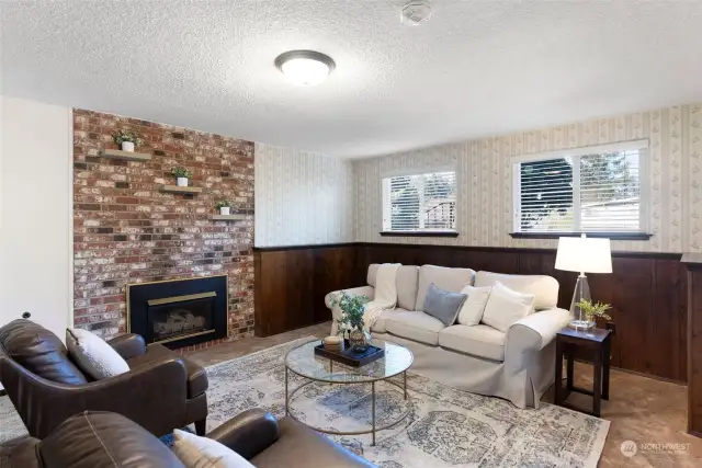 Lower level Family Room with gas fireplace insert.