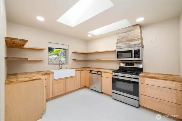 The brand-new fully-equipped kitchen in the ADU -- check out that farm sink!