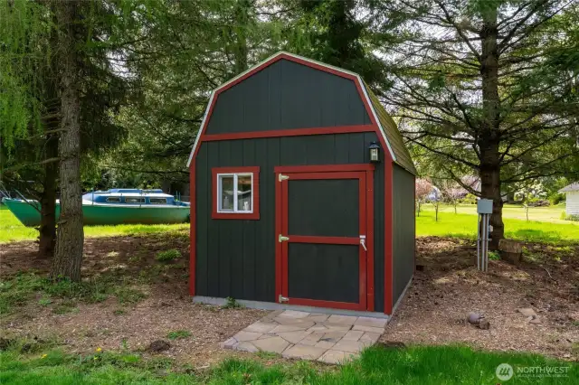 This is one of three sheds, which all have electricity. This could be used as a playhouse or art room, or whatever your imagination comes up with!