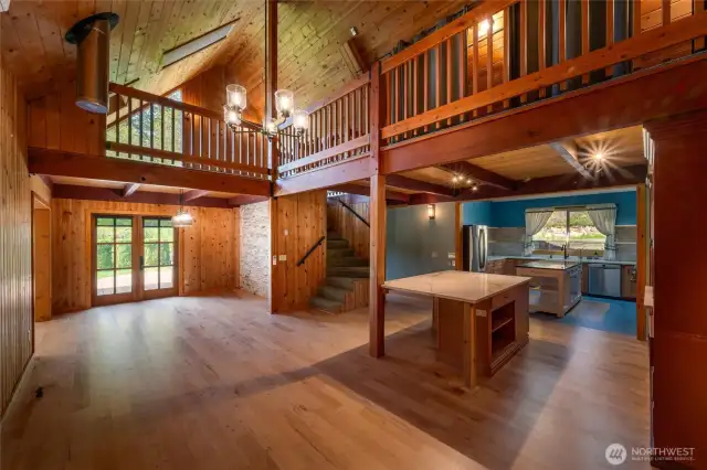From the front door, looking to the left is the dining area with French doors leading out to the side deck.