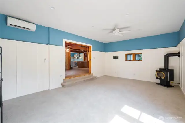 From the living room, looking back into the dining area and kitchen.