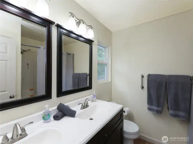 FULL Bath w/ Dual Vanity. Fantastic tile floor and Linen closet