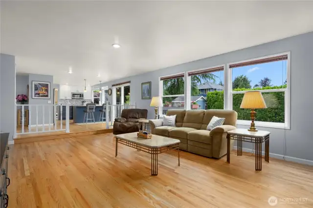 The open concept kitchen and fireside family room welcome a crowd.