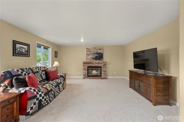 The upper bonus / family room includes the home's 3rd fireplace.