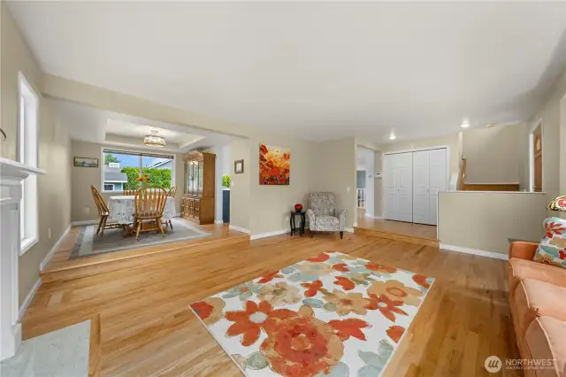 Just ahead is the formal dining room and entrance to the kitchen from the dining room and hallway.