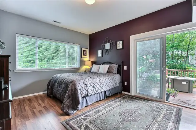 Guest bedroom has access to patio.