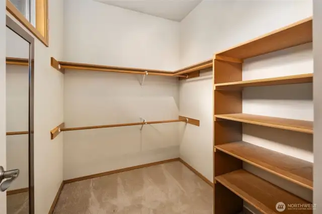 Walk in closet in primary bathroom.