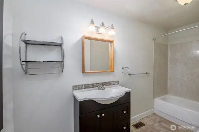 Full bathroom downstairs off the kitchen