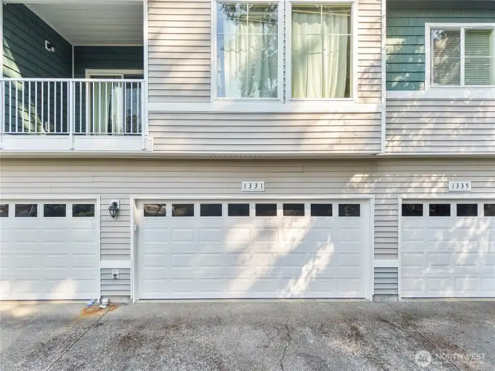 2 car attached garage at the back view.