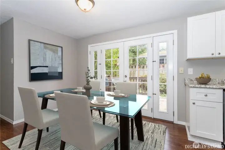 French doors lead out to modest rear deck.