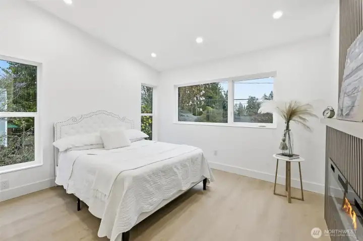 Primary suite with ensuite bath and walk-in closet.