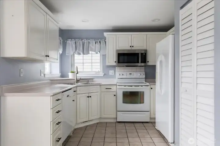 Functional kitchen with plenty of storage.
