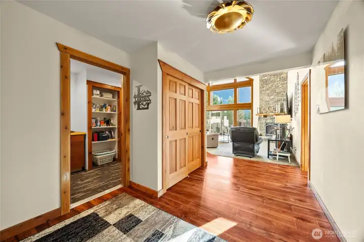 Smartly designed mudroom and laundry area located just off the main entry