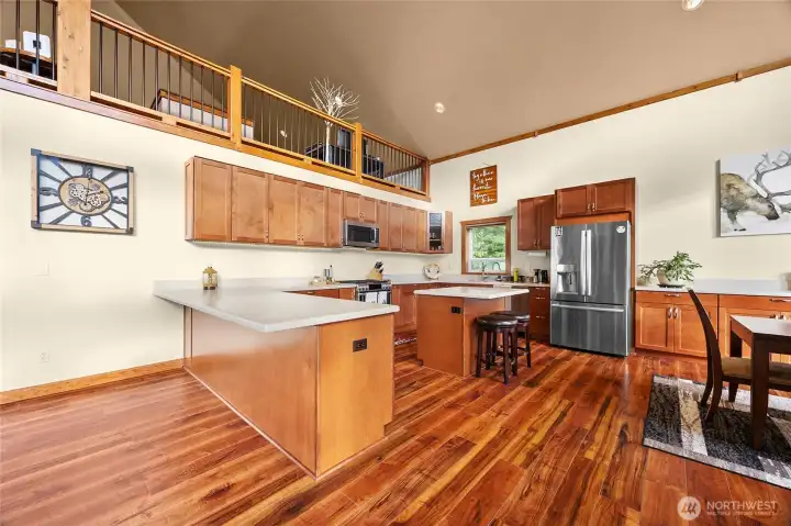 Chef’s kitchen featuring expansive cabinetry, premium countertops, and a functional layout for the cook