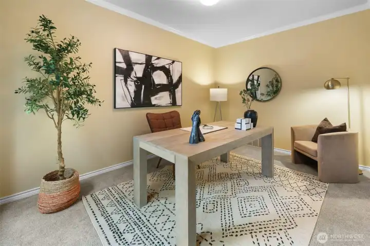 Main-floor den ideal for remote work or study.