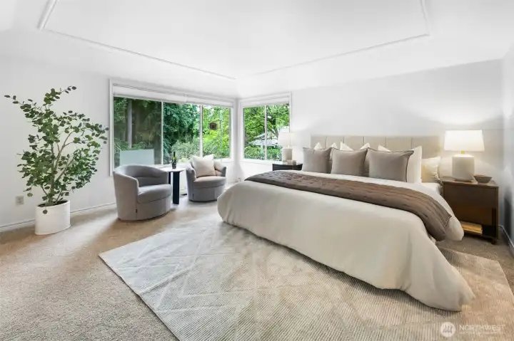 Expansive Edmonds primary suite with vaulted ceilings.