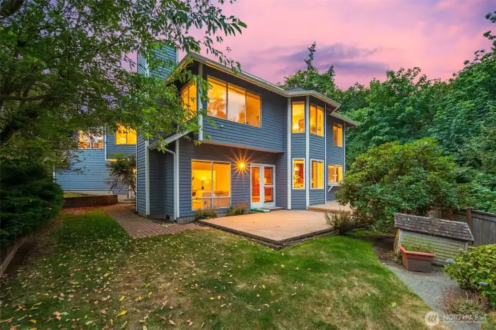 Backyard with room for gardening, pets, or play.