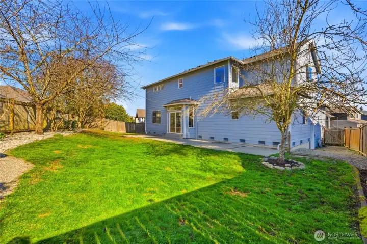 Freshened landscaping enhances both beauty and usability. There’s space for pets, play, gardening, or entertaining.