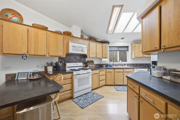 Another view showing the tiled backsplash that really finishes off the counters and cabinets.