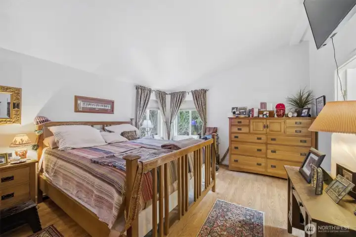 The primary bedroom is also very spacious and has lots of room for furniture and a King size bed!