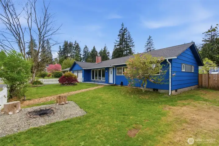 Front of the Residence with a Fire Pit.