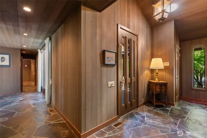 Inside the entrance.. private Primary suite to the right, living, dining, kitchen ahead