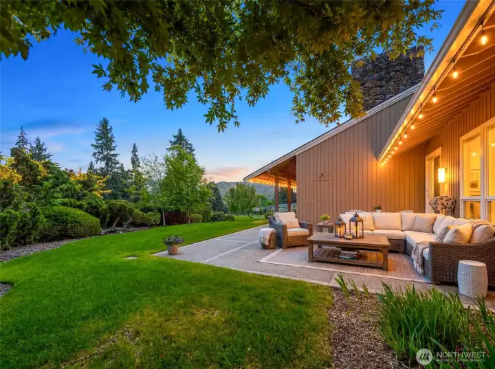 Step just out the door from the den or the primary to your private, protected back patio