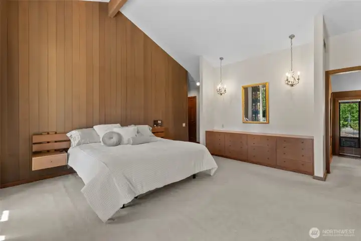 A peek on the right toward the separated en suite vanities and on the left.. the entrance to the room