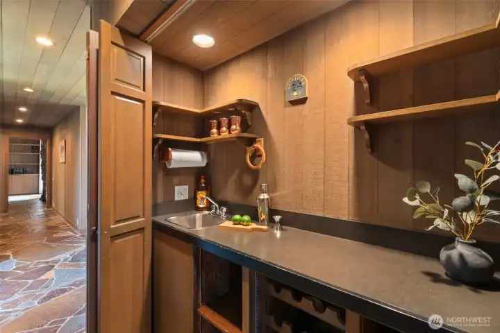 Back in the main hall ~ a wet bar perfect for entertaining.. on the other side of this wall is the dining room.