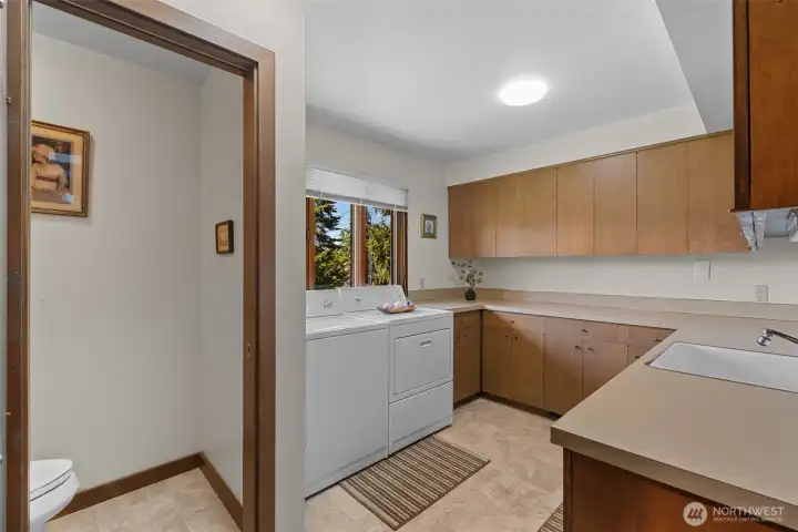 Spacious main floor laundry & 1/2 bath