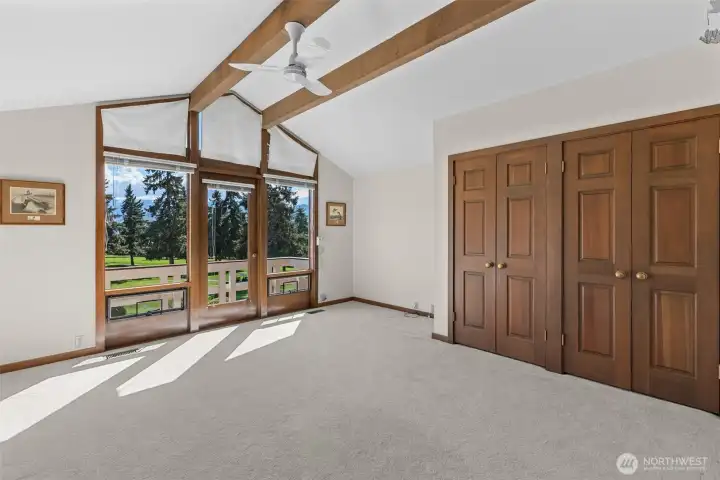 Upper bedroom #2 with built ins, double closet and another vieiwing deck.