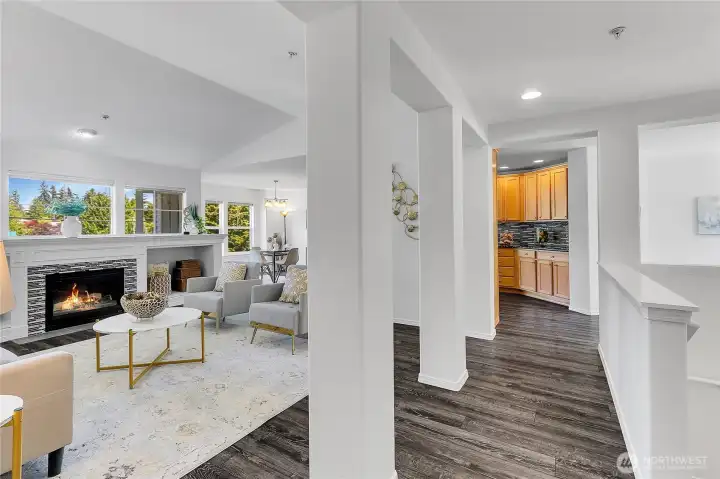 Impressive great room with cathedral ceilings, gas fireplace and flooded with natural light