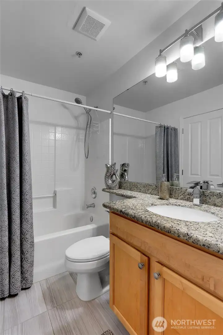 Updated Guest bath has its own door to the adjacent guest bedroom