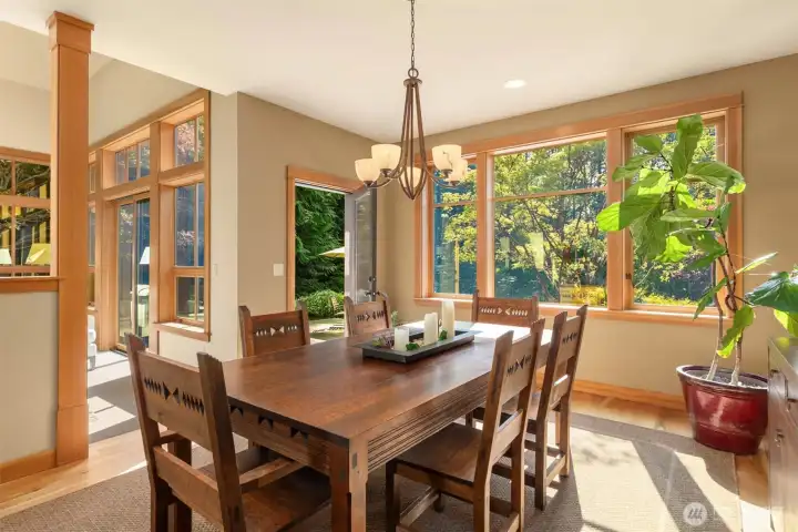 Dining room adjacent to the kitchen flows to the west facing patio. A wonderful floor plan for entertaining.