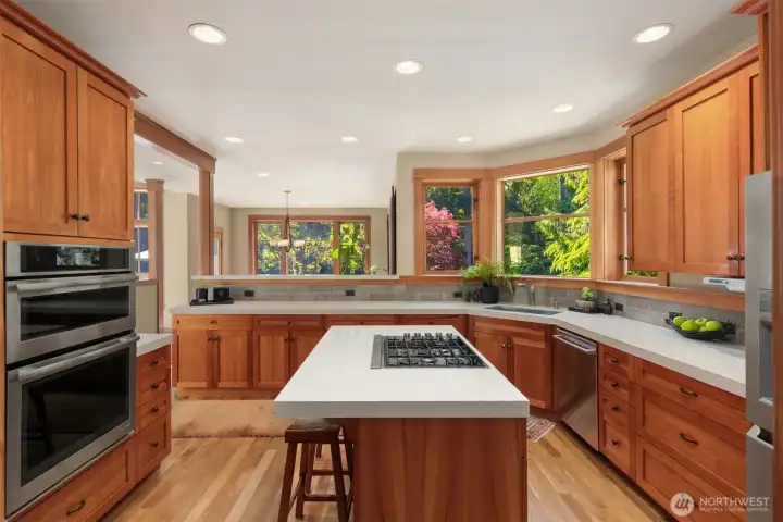 Gorgeous kitchen with cherry cabinetry, refreshed in 2019 with new appliances, quartz countertops, kohler sinks and faucets