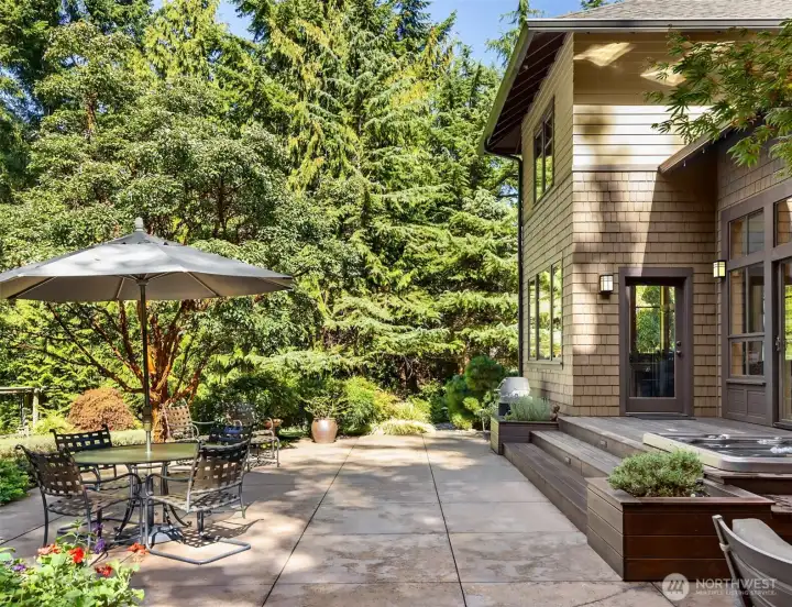 Surrounding the home is an expansive wraparound patio with ample room for outdoor dining and relaxing.