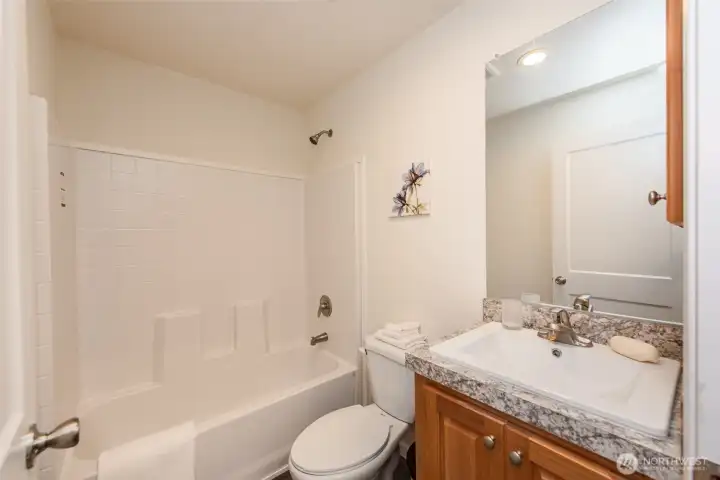 Main bathroom with tub and shower Main bathroom with tub and shower