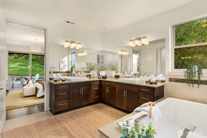 TH ensuite bath has duel sinks, large counters with plenty of storage and a large window for added natural light. TH ensuite bath has duel sinks, large counters with plenty of storage and a large window for added natural light.