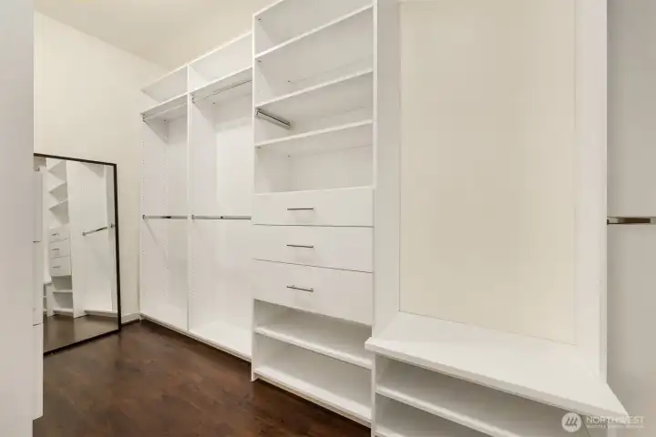 A walk-in closet offers built-in cabinets. There is a 2nd hook-up for a washer and dryer in this closet if you would like to add a main floor laundry option. A walk-in closet offers built-in cabinets. There is a 2nd hook-up for a washer and dryer in this closet if you would like to add a main floor laundry option.