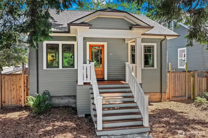 Covered front porch with Ipe deck and glass and VG fir front door. Covered front porch with Ipe deck and glass and VG fir front door.