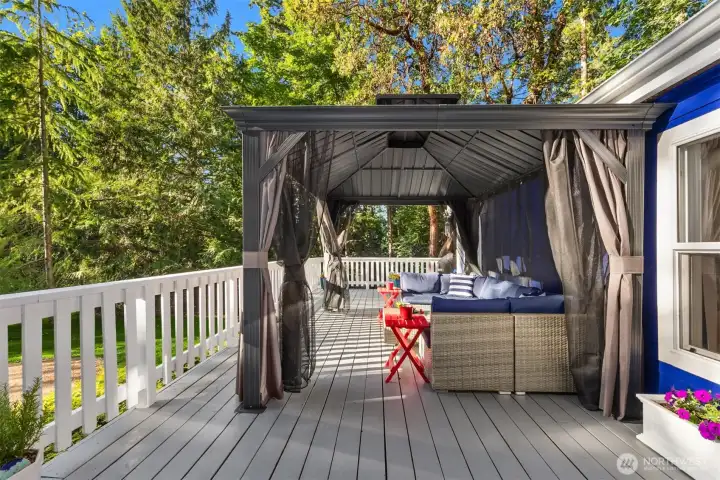 Darling gazebo affords a nice spot to read rain or shine.