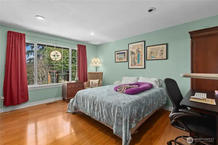 Primary bedroom opens to continental-style primary bath. Primary bedroom opens to continental-style primary bath.