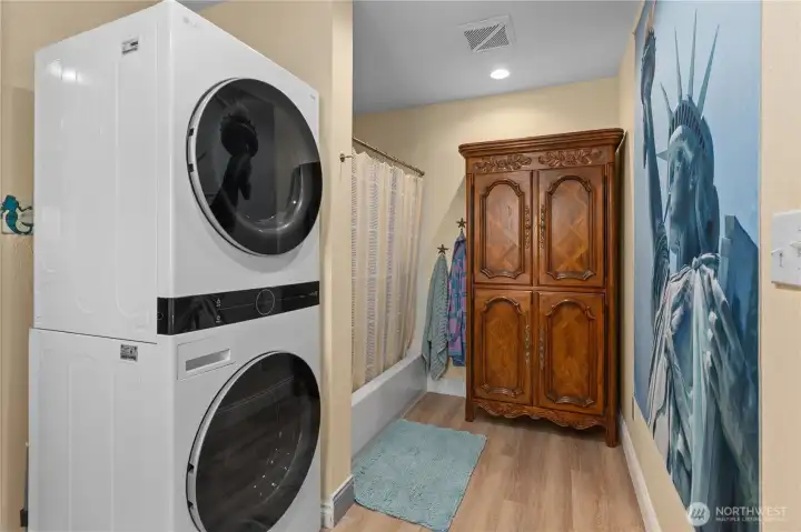 Main floor washer/dryer in primary bath. Main floor washer/dryer in primary bath.