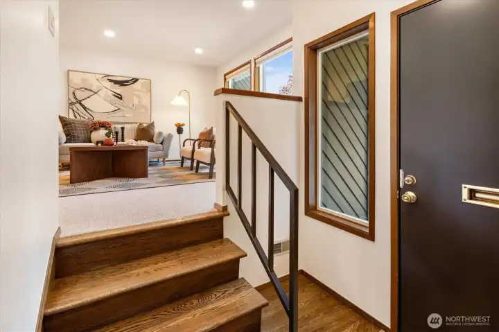 This home has a real entry way with tall ceiling, oak hardwood floors and a large coat closet. This home has a real entry way with tall ceiling, oak hardwood floors and a large coat closet.