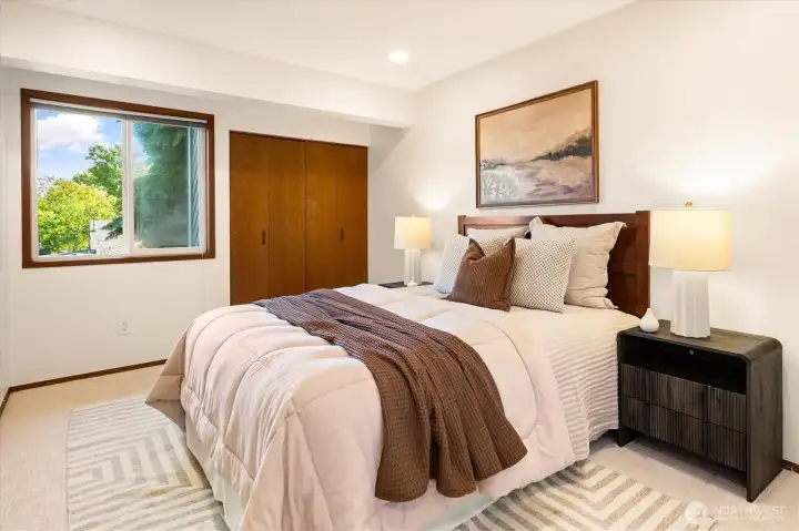 Upstairs there are two more large bedrooms, with south-facing windows and generous closets Upstairs there are two more large bedrooms, with south-facing windows and generous closets