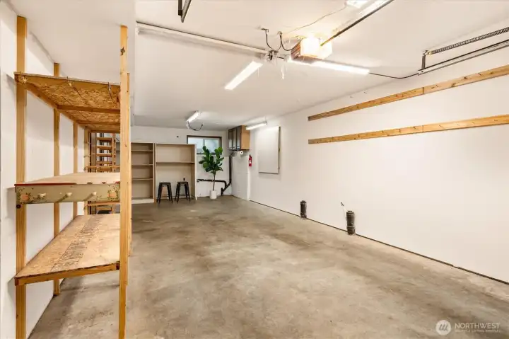 Turn the back part of the garage into a workshop space, home office or gym. Turn the back part of the garage into a workshop space, home office or gym.