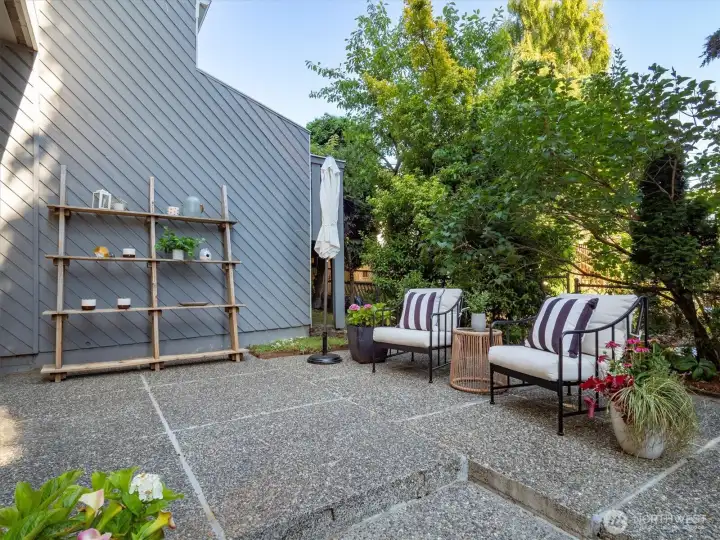 The back patio gets morning sun and afternoon shade, perfect for summer entertaining. The back patio gets morning sun and afternoon shade, perfect for summer entertaining.