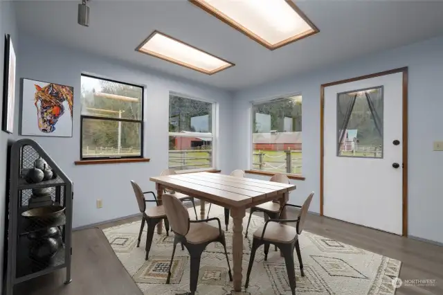 Dining area off the kitchen. Virtually staged