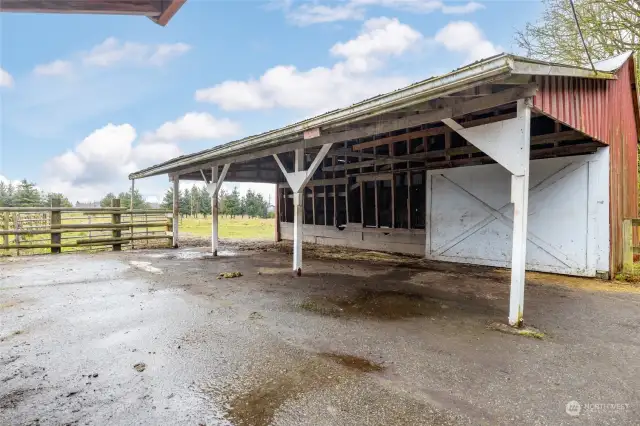 720 s/f hay barn with  feed trough. Newer metal roof and siding.