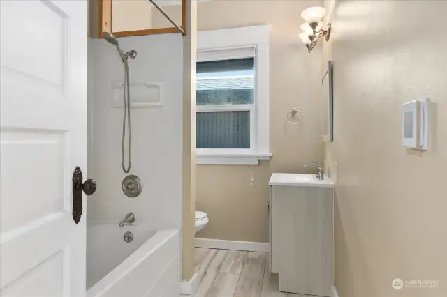 Oversized bath, w/heated floors, new vanity, premium porcelain finishes.